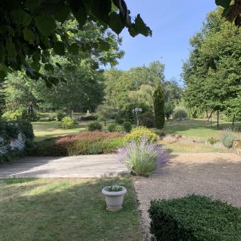 The courtyard opens onto the large grounds